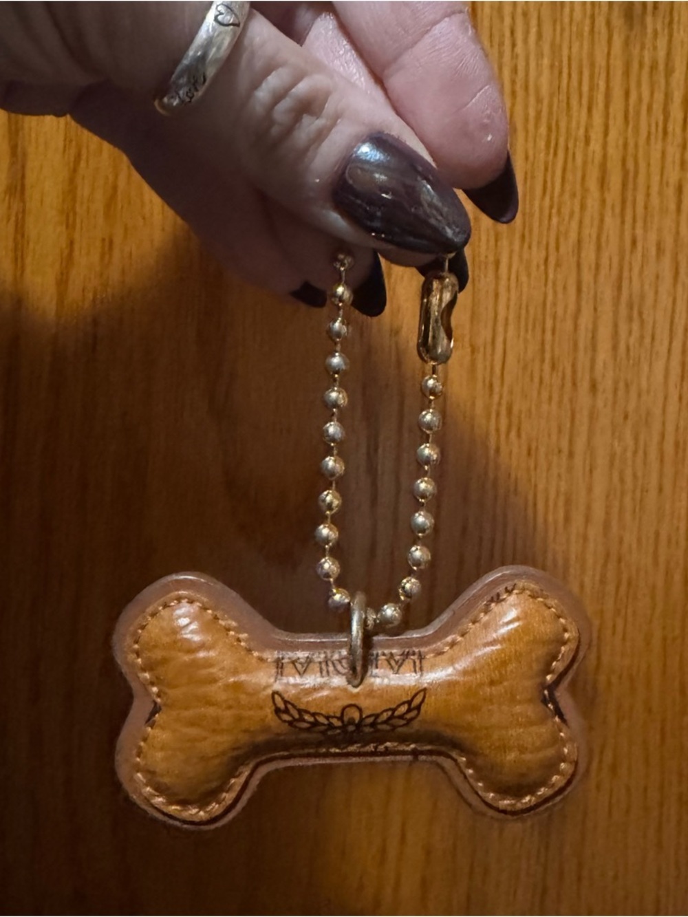 MCM Dog Bone Bag Charm (Cognac) - EUC